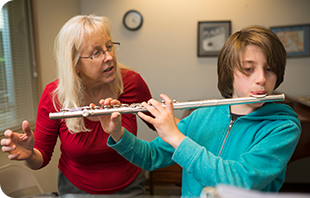 Mindy Bowman in a private lesson with a flute student